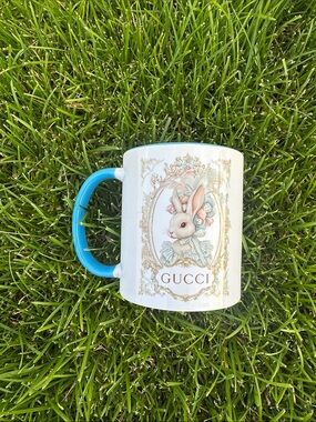 Gucci White Mug with Blue Handle and Pastel Bunny Motif